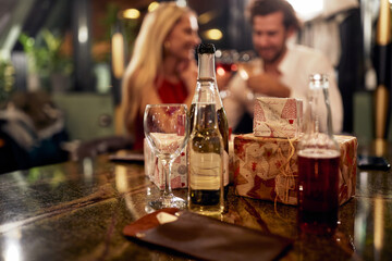 A young couple in love celebrating anniversary in restaurant. Together, Valentine's day, celebration