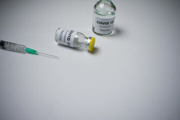 The coronavirus vaccine and syringe injection are used for protection from Covid-19, nCoV 2019...
