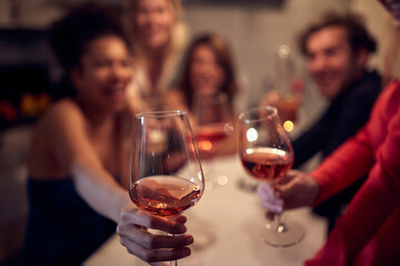 A group of cheerful friends toasting and posing for a photo of  New Year eve home party. Friendship, together, party, New Year