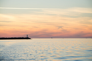 Fototapeta na wymiar sunset lighthouse sea