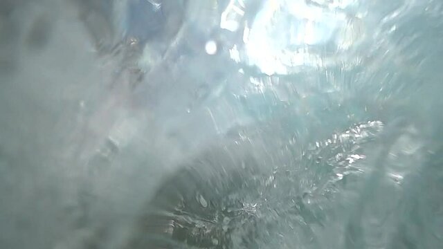 9x slow motion footage of coming wave at sunny day at sandy beach