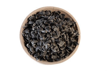 Sunflower seeds in a plate on a white background