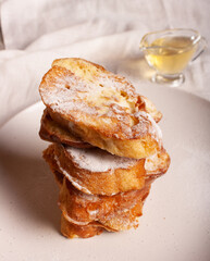 Torrijas. A dish of Spanish cuisine. Sweet white bread with a crispy crust. With apricot topping.