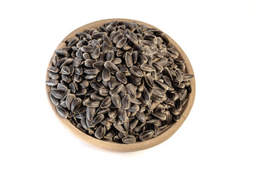 Sunflower seeds in a plate on a white background
