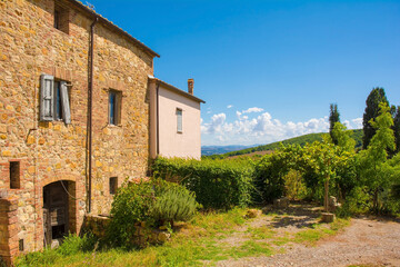Fototapeta na wymiar Buildings in the historic medieval village of Murlo, Siena Province, Tuscany, Italy 