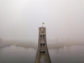 Aerial drone view. Flag of Ukraine on the North Bridge in Kiev.