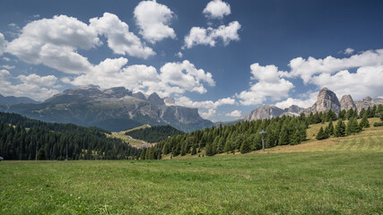 Marmolada massif. Sella group and Sassongher mountain (from Left to Right) as seen from Piz La Ila and La Frainas mountain plateaus, La Villa, Val Badia, Alta Badia, Dolomites, South Tyro, Italy.
