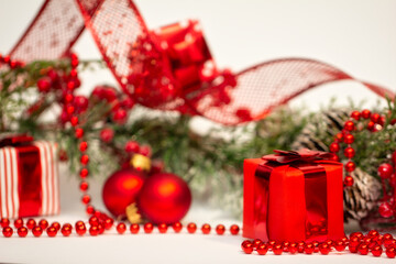 winter christmas background decorations with fir branches and cones on white background