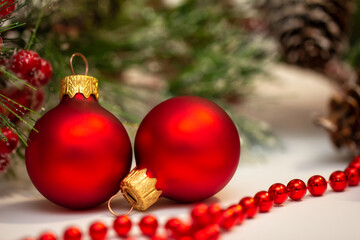 winter christmas background decorations with fir branches and cones on white background