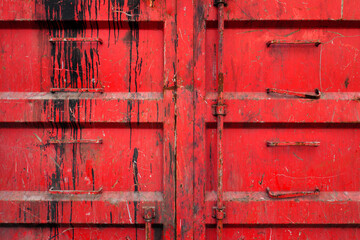 Detail von rotem Container mit abgenutzter Oberfläche  - Symbolbild für die Farbe Rot - Stockfoto