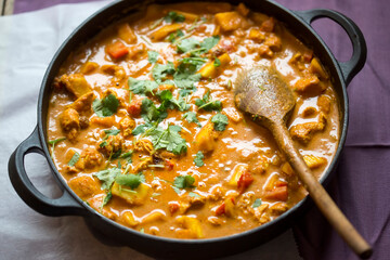 Chicken tikka masala with red peppers and mango chutney