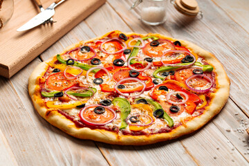 Vegetable pizza with olives and pepper
