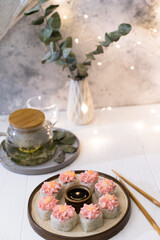 Sushi roll with pink cream, salmon