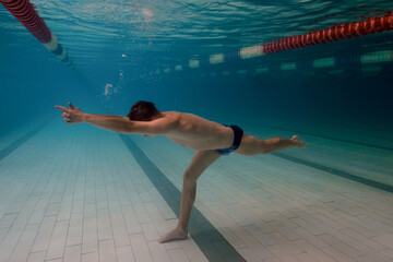 underwater yoga in the pool, meditation and relaxation pose