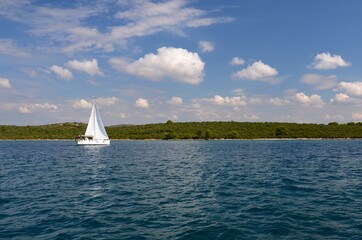 Boat sailing in the Adriatic Sea, Croatia on a sunny day.