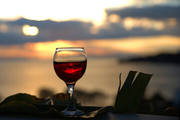 red wine in a glass at sunset,summer wine