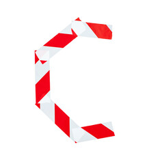 Obraz premium Letter C from red and white warning tape. Isolated on white background