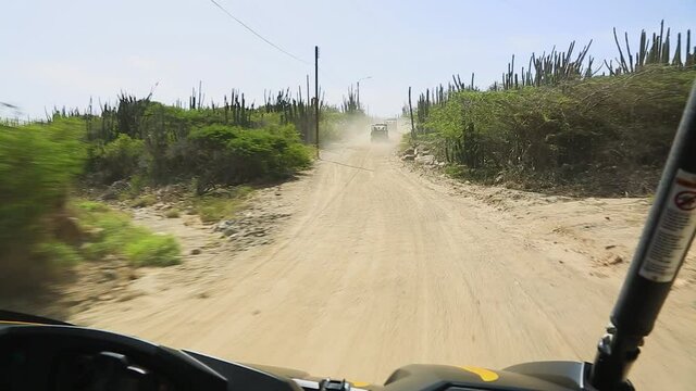 Natural beauty of Aruba. Off-road UTV Aruba tour. Amazing stone desert landscape and blue sky. Aruba.	