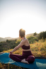 Women practicing yoga in nature