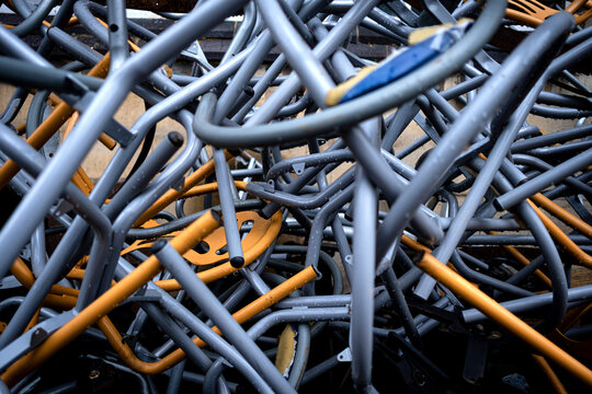Pile of metal chairs.