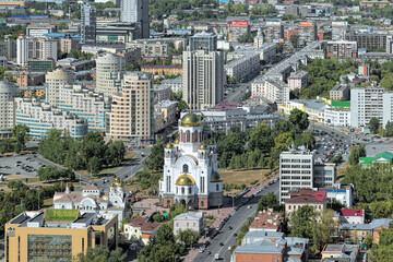 Fototapeta na wymiar Yekaterinburg, Russia. High angle view of the Church on Blood in Honour of All Saints Resplendent in the Russian Land. View from the observation deck of the Vysotsky skyscraper.