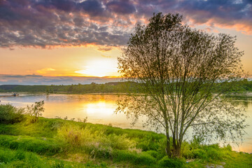 Fototapeta na wymiar reflection in water, river in poland, Kazimierz Dolny, vistula over the sunset