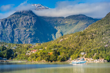 Fototapeta na wymiar Caleta Tortel / Aysen /Chile: Boats in the bay at Patagonia.