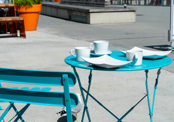 Blue table and chair out doors