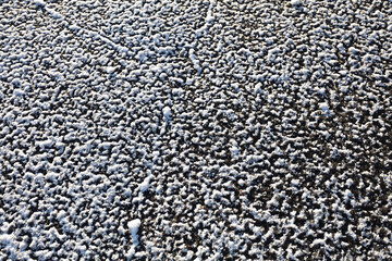 road covered with frost. concept, dangerous traffic, ice