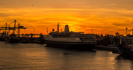 Fototapeta premium A view of the cruise berths in the port of Leixoes, near to Porto, Portugal at sunset