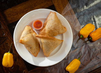 Samosa take away with red sauce