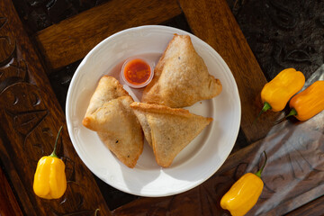 Samosa take away with red sauce
