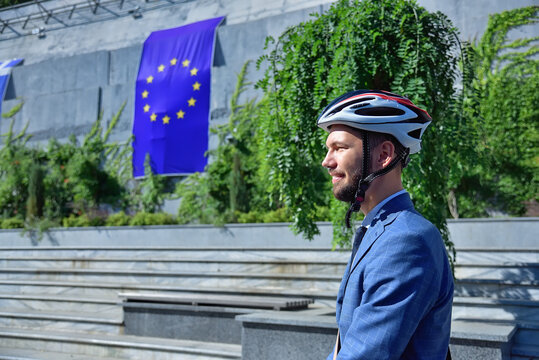 Bearded businessman in helmet