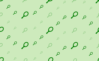 Seamless pattern of large and small green tennis symbols. The elements are arranged in a wavy. Vector illustration on light green background