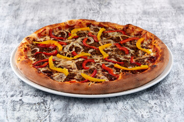 fresh pizza on the white plate