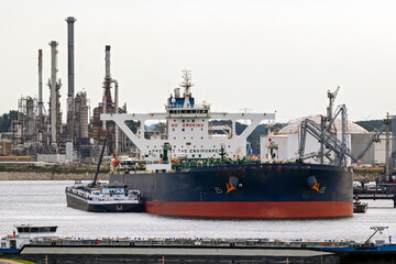 Oil tankers moored near a petrochemical plant in the Port of Rotterdam.