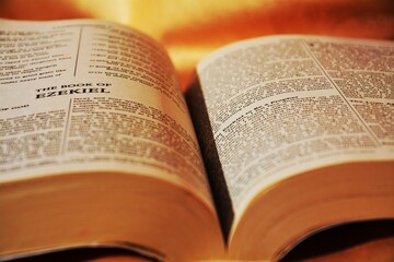 Fototapeta premium Pages of a bible, open book on the table