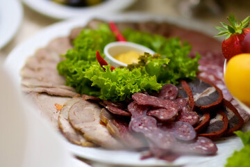 Restaurant dish of sliced meat