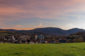 Fototapeta na wymiar Nice sunny autumn morning before sunrise over Hejnice town in north Bohemia