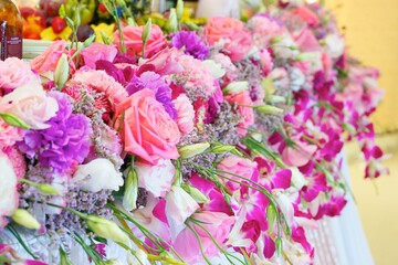 The composition is made by florists from fresh flowers.