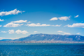 Puerto Natales view from the boat crossing Magallanes and the Chilean Antarctic Region, Chile. © raccoon