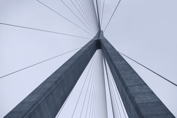 Tall suspension bridge view from bottom