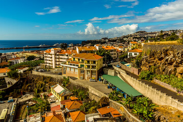 A view down over the roof tops of Funchal, Madeira out to sea