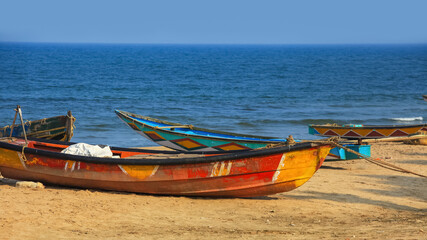 Colorful fishermen boats at Rushikonda beach near Visakhapatnam city in India.