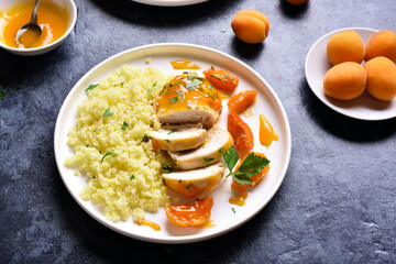 Chicken breasts in apricot sauce and couscous