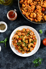 Creole jambalaya with chicken, smoked sausages and vegetables