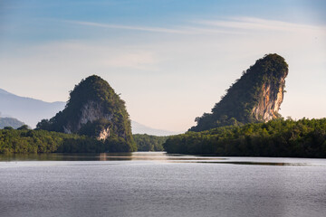 Khao kha nab nam at Krabi Thailand. The famous tourist attraction in southern of thailand. Twin mountains have rivers through the middle - 393956891