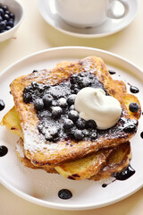 French toasts with blueberry sauce