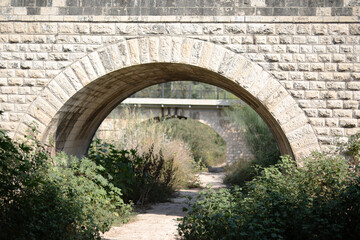 Fototapeta na wymiar Old Turkish stone bridge Israel