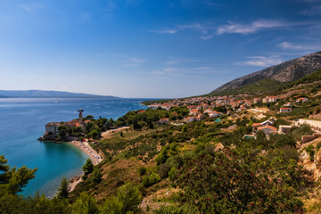 Fototapeta na wymiar Town of Bol coast aerial view, Island of Brac, Dalmatia, Croatia. August 2020